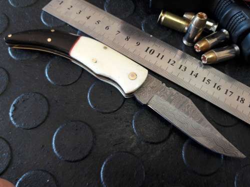 Handmade DAMASCUS  Folding Knife. Please study pictures for detail. Crazy R1 start, No reserve.