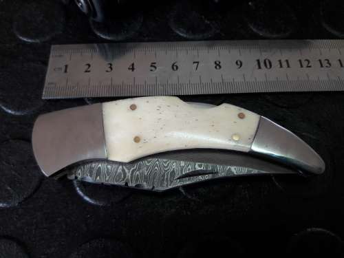 Handmade DAMASCUS  Folding Knife. Please study pictures for detail. Crazy R1 start, No reserve.