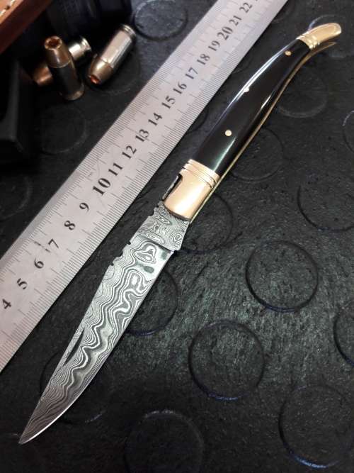 Handmade DAMASCUS  Folding Knife with Bull Horn handle scales. Crazy R1 start, No reserve.