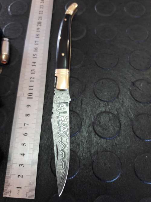 Handmade DAMASCUS  Folding Knife with Bull Horn handle scales. Crazy R1 start, No reserve.
