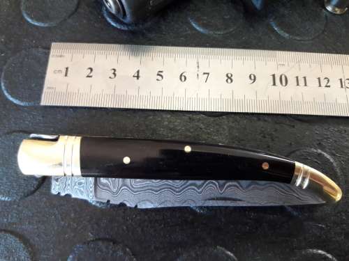 Handmade DAMASCUS  Folding Knife with Bull Horn handle scales. Crazy R1 start, No reserve.