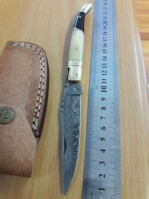 Handmade DAMASCUS  Folding Knife. Please study pictures for detail. Crazy R1 start, No reserve.