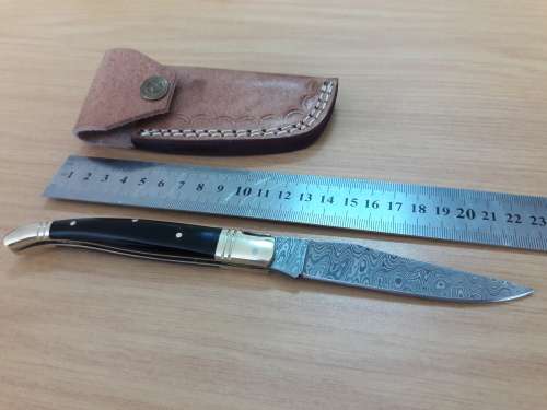 HANDMADE Damascus  steel folding knife with BULL HORN handle scales.