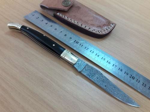 HANDMADE Damascus  steel folding knife with BULL HORN handle scales.