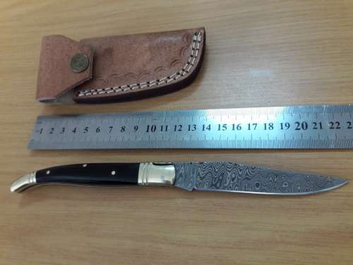 HANDMADE Damascus  steel folding knife with BULL HORN handle scales.