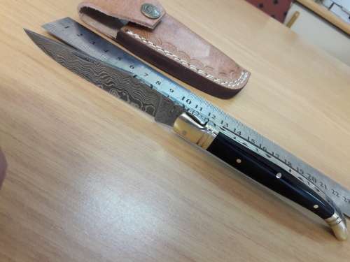 HANDMADE Damascus  steel folding knife with BULL HORN handle scales.