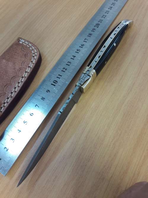 HANDMADE Damascus  steel folding knife with BULL HORN handle scales.
