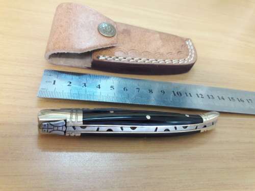 HANDMADE Damascus  steel folding knife with BULL HORN handle scales.