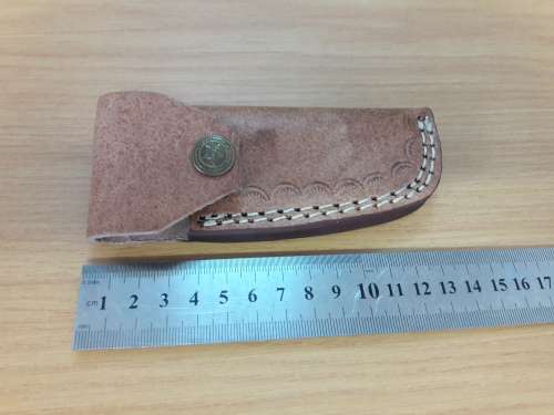 HANDMADE Damascus  steel folding knife with BULL HORN handle scales.