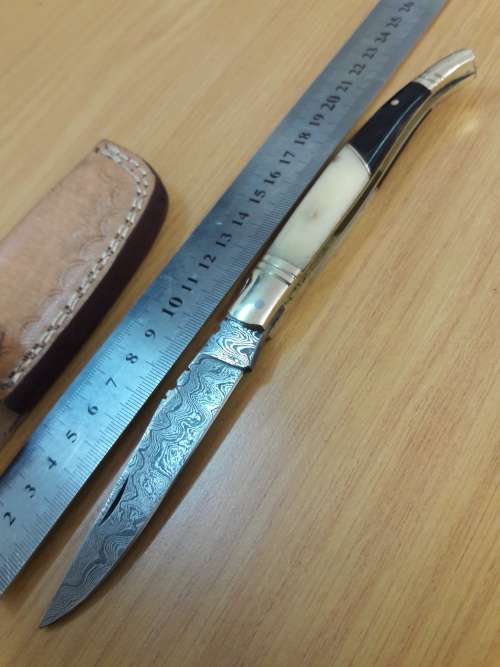 Handmade DAMASCUS  Folding Knife. Please study pictures for detail. Crazy R1 start, No reserve.