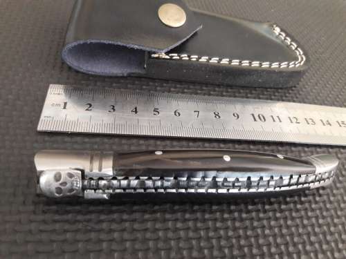 HANDMADE Black Ops, 1095 HIGH Carbon High quality steel folding knife with Bull Horn handle scales.