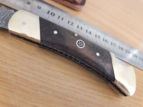 Handmade Damascus steel folding knife with Wooden handle scales. I CAN SEND PARCELS.