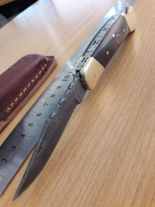 Handmade Damascus steel folding knife with Wooden handle scales. I CAN SEND PARCELS.