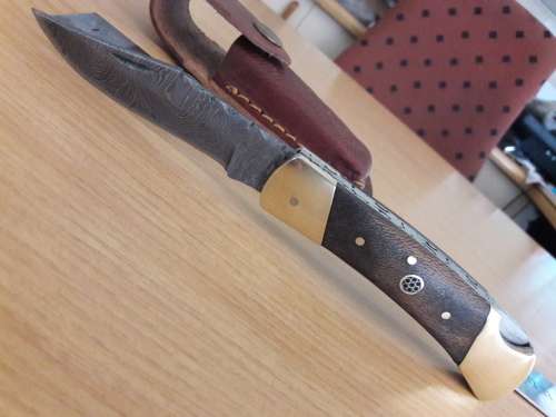 Handmade Damascus steel folding knife with Wooden handle scales. I CAN SEND PARCELS.