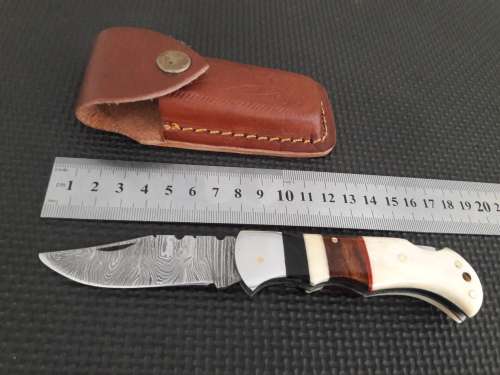 Handmade Damascus steel folding knife with CAMEL BONE and WOODEN handle scales.