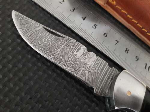 Handmade Damascus steel folding knife with CAMEL BONE and WOODEN handle scales.
