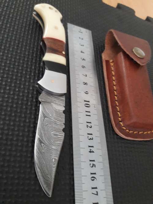 Handmade Damascus steel folding knife with CAMEL BONE and WOODEN handle scales.