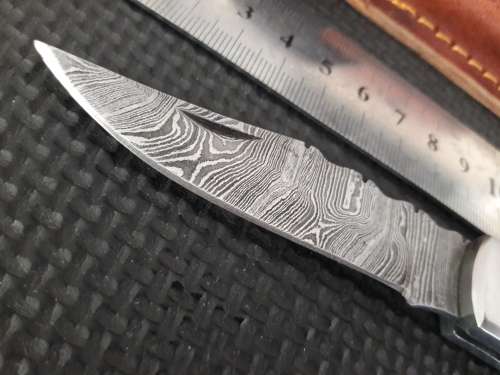 Handmade Damascus steel folding knife with WOOD & CAMEL BONE handle scales.