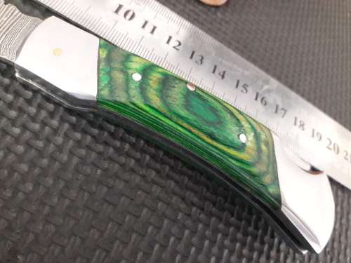 Handmade Damascus steel folding knife with WOOD & CAMEL BONE handle scales.