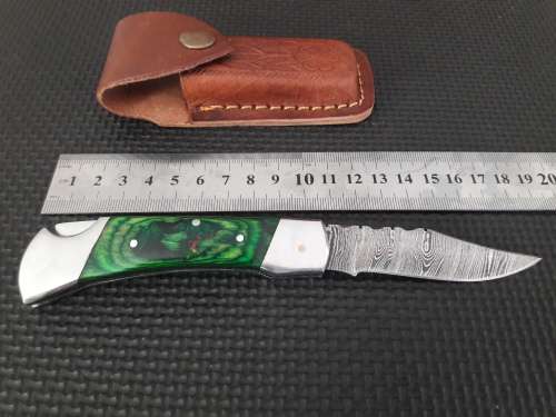 Handmade Damascus steel folding knife with WOOD & CAMEL BONE handle scales.