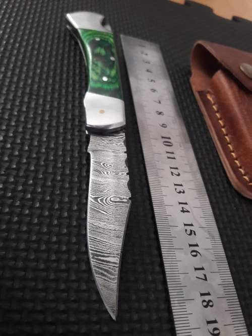 Handmade Damascus steel folding knife with WOOD & CAMEL BONE handle scales.