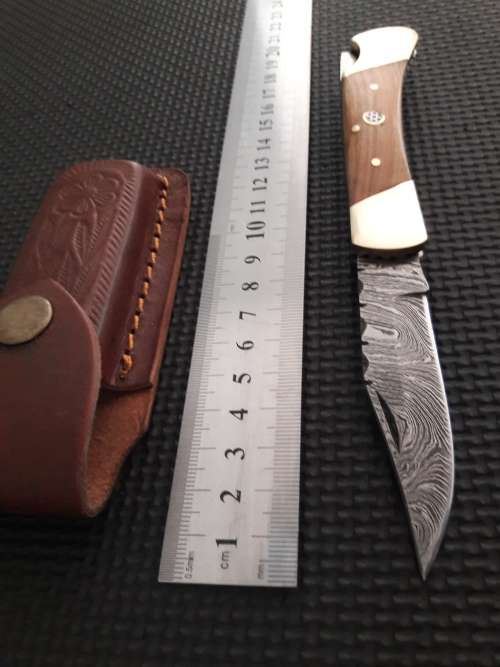 Handmade Damascus steel folding knife with WOODEN handle scales.