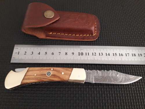 Handmade Damascus steel folding knife with WOODEN handle scales.