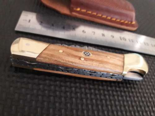 Handmade Damascus steel folding knife with WOODEN handle scales.