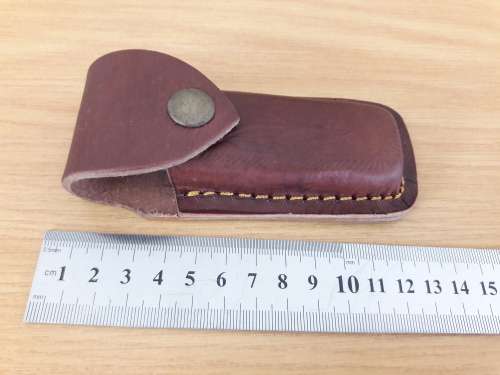 Handmade Damascus steel folding knife with WOODEN handle scales.