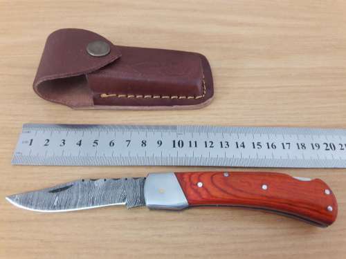 Handmade Damascus steel folding knife with WOODEN handle scales.
