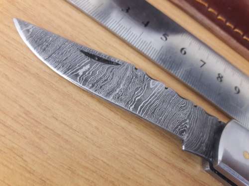 Handmade Damascus steel folding knife with WOODEN handle scales.
