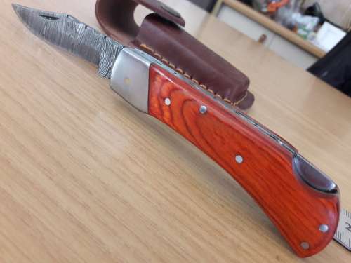 Handmade Damascus steel folding knife with WOODEN handle scales.