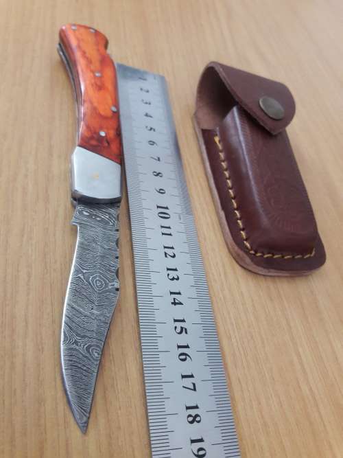 Handmade Damascus steel folding knife with WOODEN handle scales.