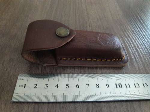 Handmade Damascus steel folding knife with Resin handle scales.