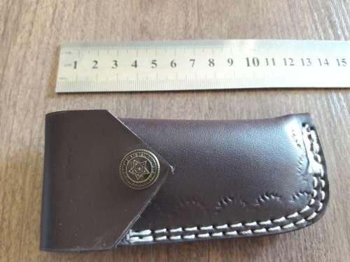 Handmade Damascus steel folding knife with CAMEL BONE handle scales.