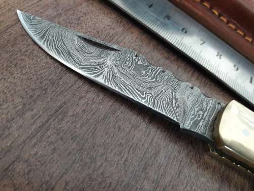 Handmade Damascus steel folding knife with CAMEL BONE handle scales.