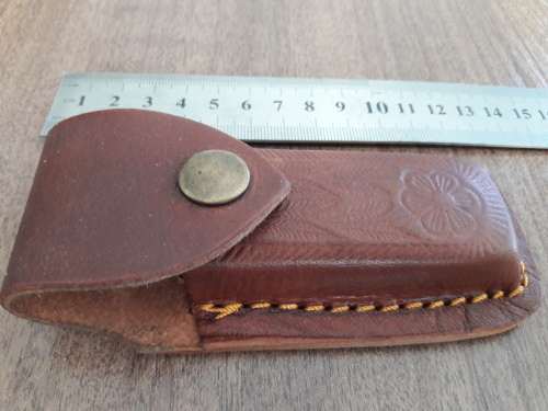 Handmade Damascus steel folding knife with CAMEL BONE handle scales.