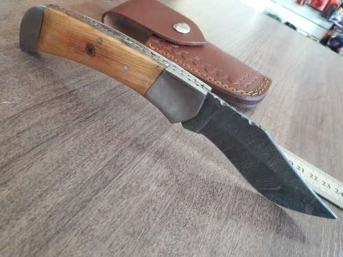 Handmade Damascus steel folding knife with Wooden handle scales. Bigger size.