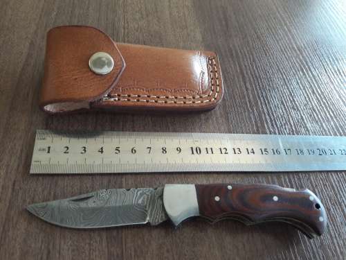 Handmade Damascus steel folding knife with MICARTA handle scales. THIS AUCTION will only ship 28th