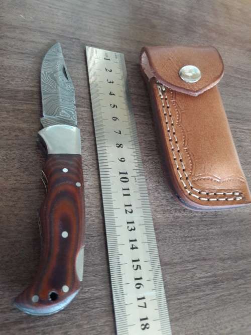Handmade Damascus steel folding knife with MICARTA handle scales. THIS AUCTION will only ship 28th