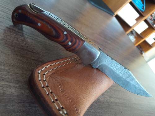 Handmade Damascus steel folding knife with MICARTA handle scales. THIS AUCTION will only ship 28th