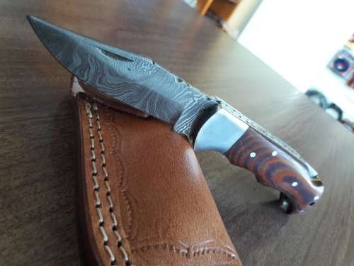 Handmade Damascus steel folding knife with MICARTA handle scales. THIS AUCTION will only ship 28th