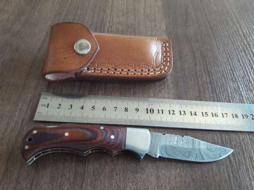Handmade Damascus steel folding knife with MICARTA handle scales. THIS AUCTION will only ship 28th