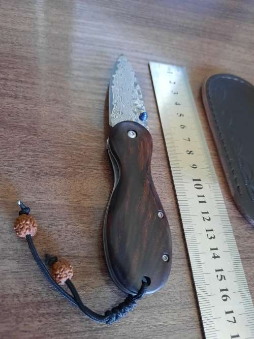 Damascus VG-10 Stainless Steel folding knife, RAZOR Sharp, New Stock,  Sandalwood handle scales.