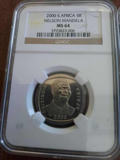 Mandela Smiley 2 piece set, NGC Graded MS64 & MS65 (Second Finest) One bid for both graded coins.