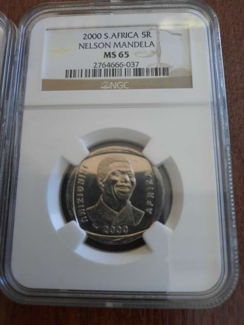Mandela Smiley 2 piece set, NGC Graded MS64 & MS65 (Second Finest) One bid for both graded coins.