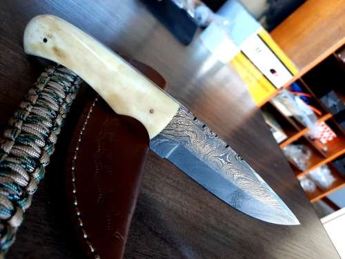 Handmade Damascus steel HUNTING  knife with Camel Bone handle scales. Free Survival Bracelet !!!!