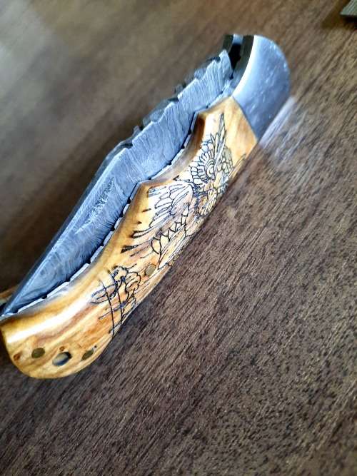 Handmade Damascus steel folding knife with wooden handle scales. OWL picture engraved. NEW STOCK !