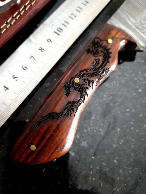 Handmade Damascus steel HUNTING Knife with Wooden handle scales w an eagle engraved. Free Bracelet.