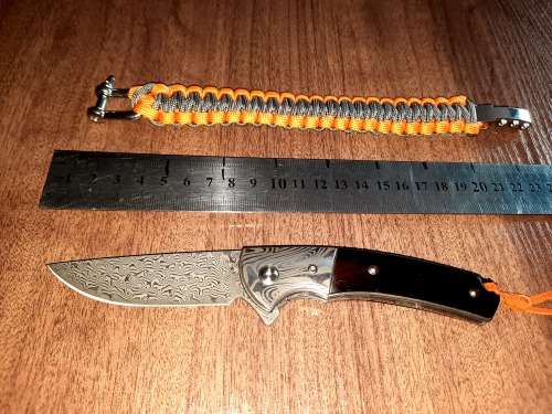 Damascus VG-10 Stainless Steel folding knife, RAZOR Sharp, EBONY handle scales, bolster engraved.